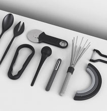 Load image into Gallery viewer, Normann Copenhagen Pizza Wheel with Bottle Opener Handle – Black
