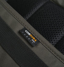 Load image into Gallery viewer, Carhartt WIP Payton Carrier Backpack – Cypress
